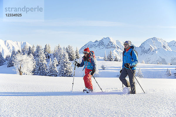 Austria  Tyrol  couple snowshoeing