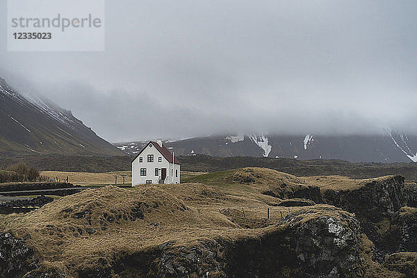 Iceland  North of Iceland  landscape with single white house