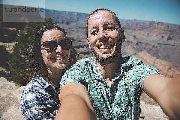 USA  Arizona  Grand Canyon National Park  happy couple taking a selfie