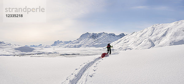 Greenland  Schweizerland Alps  Kulusuk  Tasiilaq  female ski tourer