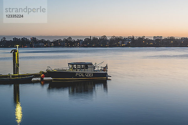 Germany  Hamburg  Outer Alster Lake  mooring area  police boat in the morning