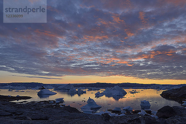 Greenland  East Greenland  view from Sarpaq over the icebergs of Sermilik fjord in the evening