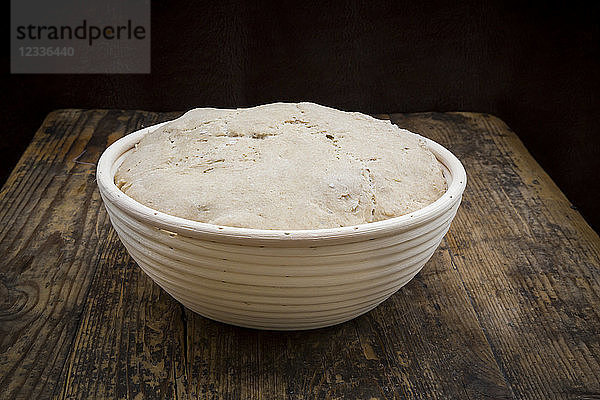 Homemade sourgough bread in baking basket