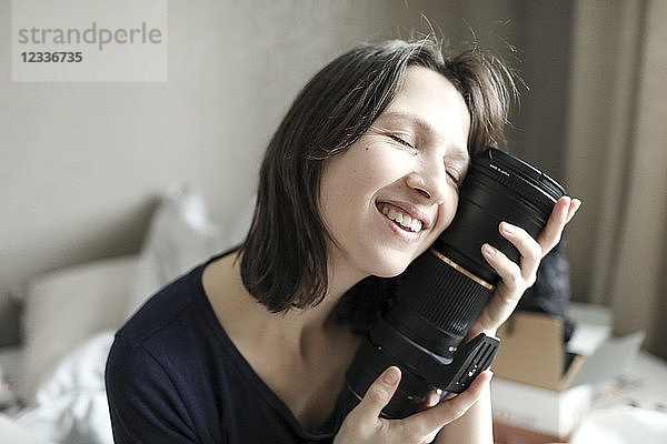Woman enjoying her new lens