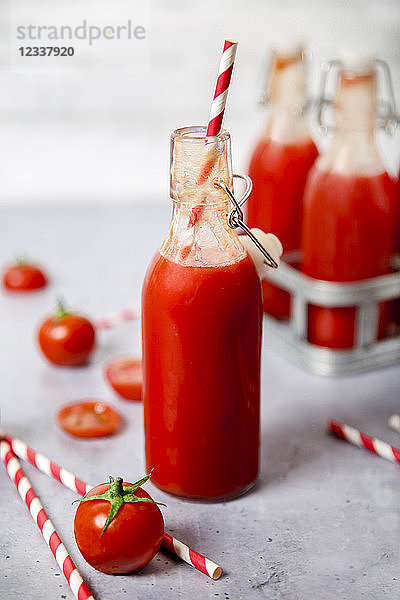 Homemade tomato juice in swing top bottle