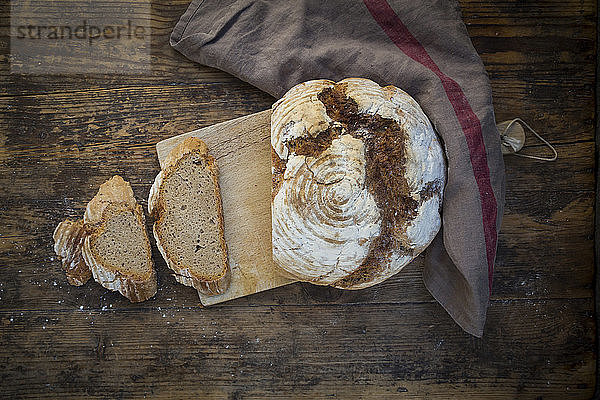 Homemade sourgough rye bread on chopping board