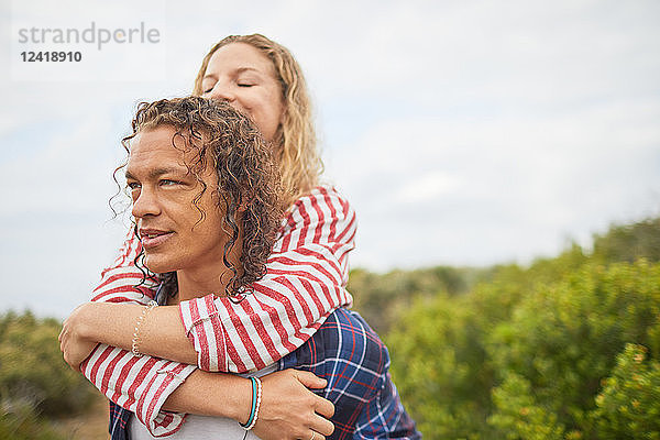 Affectionate couple hugging