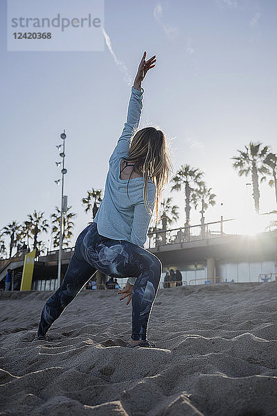 Woman during workout on the beach