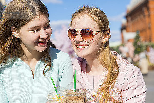 Russia  Moscow  teenage girls drinking a delicious frappe in the city