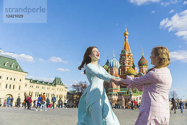 Russia  Moscow  happy and carefree teenage girls on the Red Square