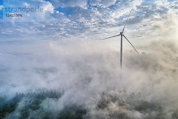 Germany  Baden-Wuerttemberg  Schurwald  Aerial view of wind wheel and morning fog