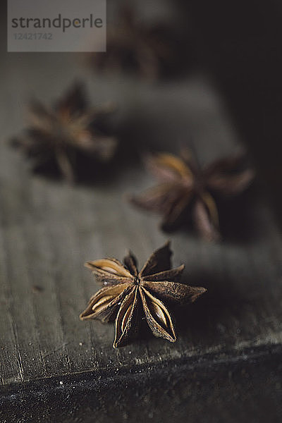 Star anise on wood  close-up