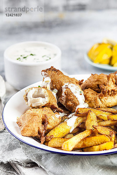 Classic english fish and chips with tartare sauce