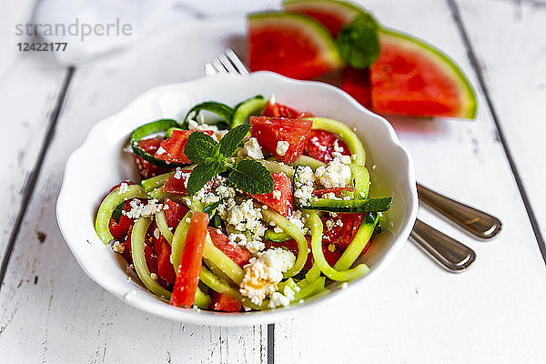 Bowl of salad with watermelon  cucumber  feta and mint