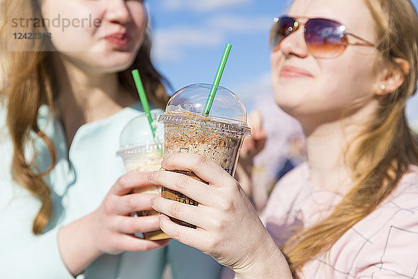 Russia  Moscow  teenage girls drinking a delicious frappe