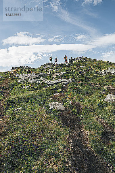 Norway  Lofoten  Young men hiking in Moskenesoy