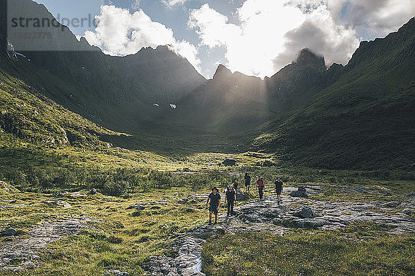 Norway  Lofoten  Young men hiking in Moskenesoy