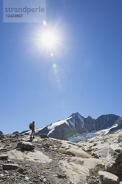 Austria  Carinthia  hiker watching Grossglockner peak and high alpine territory