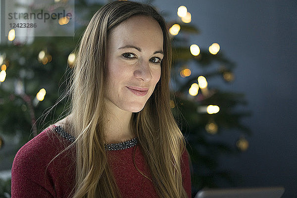Portrait of smiling woman at Christmas time