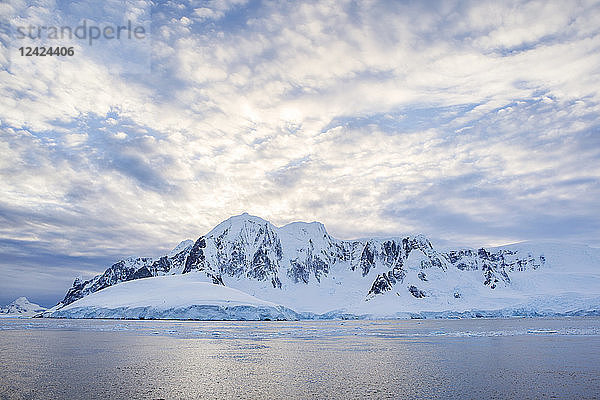 Antarctic  Antarctic Peninsula  snow covered mountains with ice and glacier in the morning