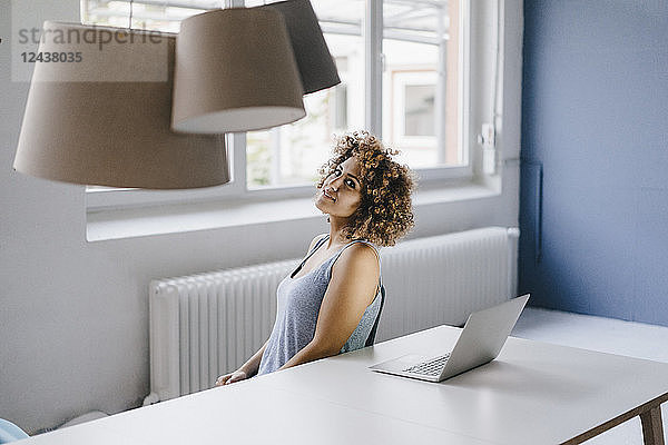 Woman working overtime in her start-up business