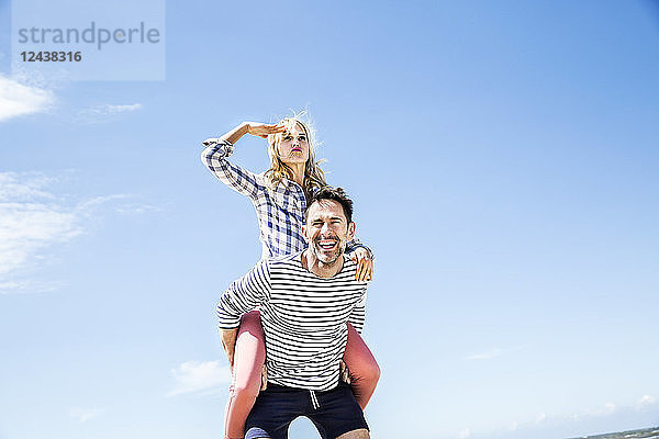 Happy playful couple outdoors