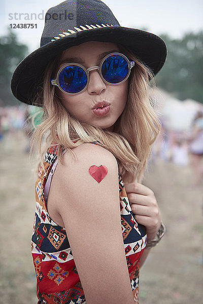 Portrait of hipster woman at the music festival