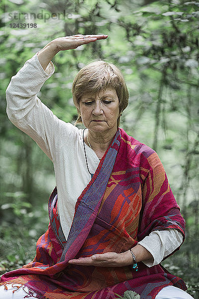 Senior woman doing yoga  meditating