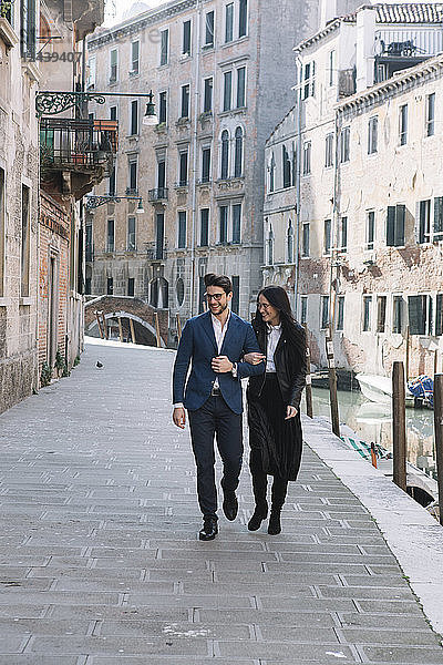 Italy  Venice  happy couple walking in the city