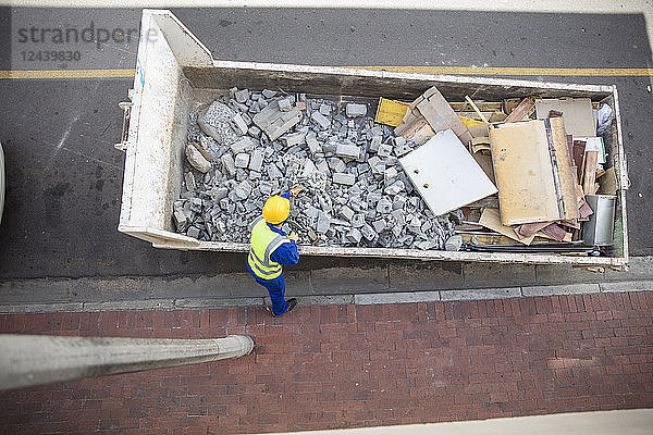 South Africa  Cape Town  South Africa  Builder looking at rubble