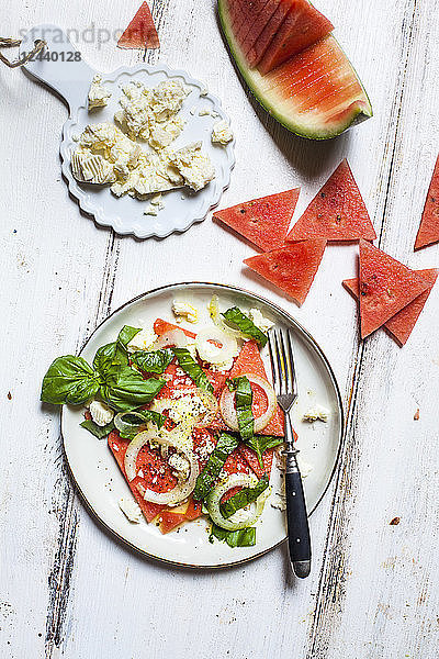 Watermelon salad with onions  feta and basil