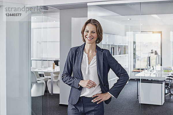 Portrait of smiling businesswoman in office