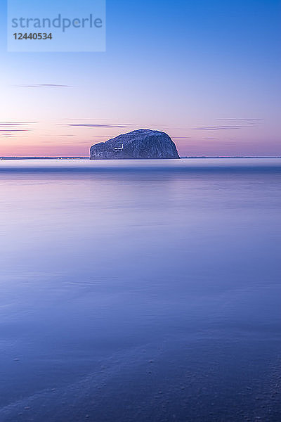 UK  Scotland  North Berwick  Firth of Forth  view to Bass Rock with lighthouse at sunset  long exposure