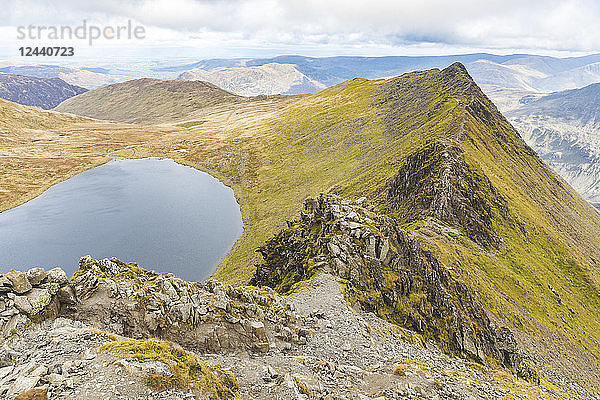 United Kingdom  England  Cumbria  Lake District  view of Striding edge and Red Tarn lake from Helvellyn peak