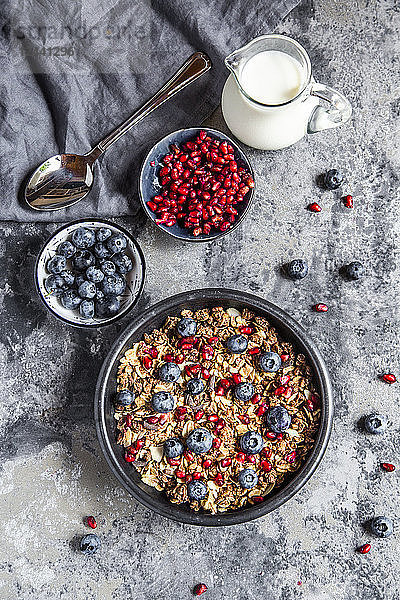 Bowl of muesli with blueberries and pomegranate seed