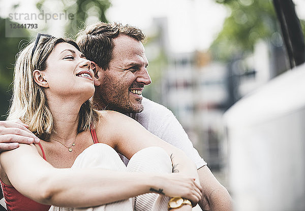 Happy couple relaxing outdoors