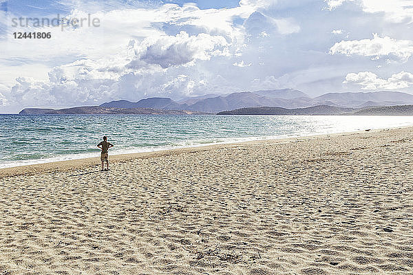 Greece  Peloponnese  Mani peninsula  man at the beach of Mavrovouni
