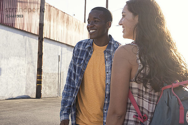 Happy young couple outdoors