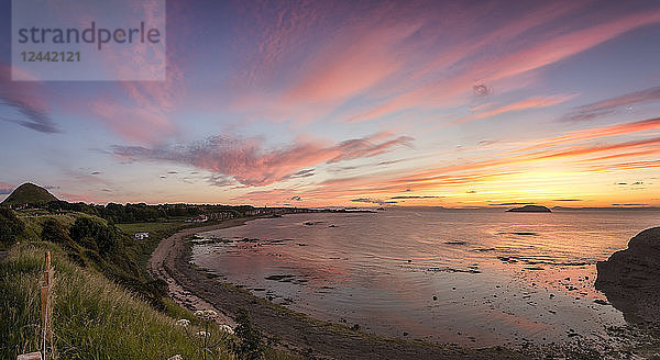 UK  Scotland  North Berwick  sun setting across the east bay North Berwick and the Firth of Forth