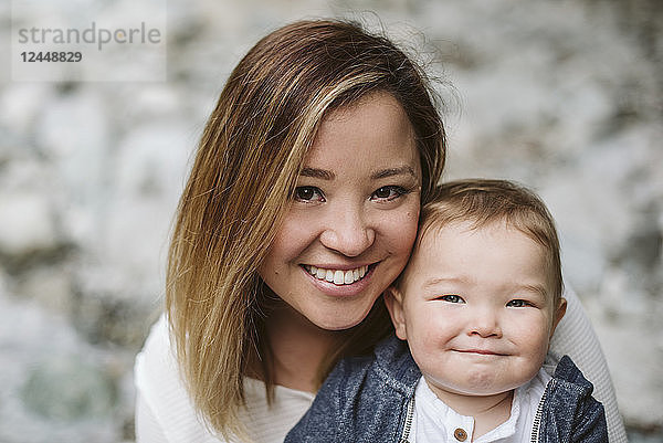 Portrait smiling mother and cute baby son