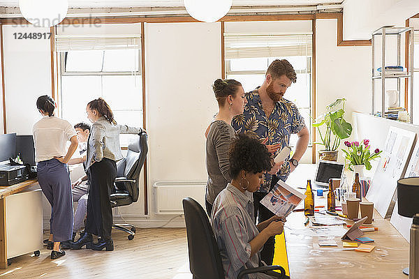 Creative designers brainstorming  planning in office