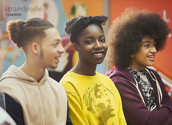 Portrait smiling  confident teenage girl with friends