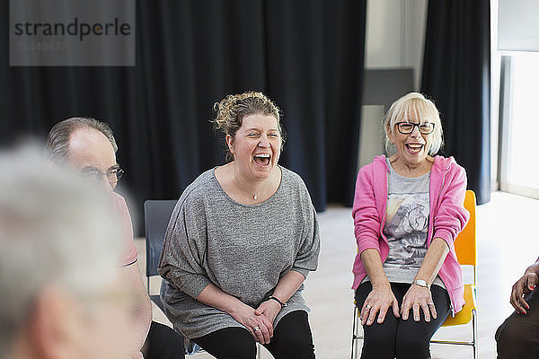 Women laughing in community center