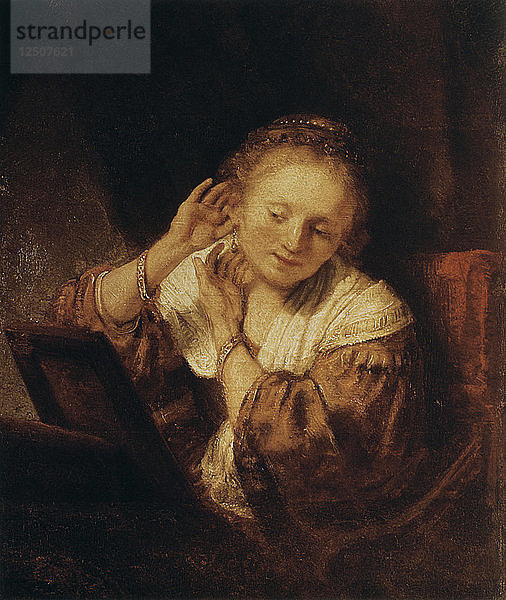 Junge Frau mit Ohrringen  1657. Künstler: Rembrandt Harmensz van Rijn