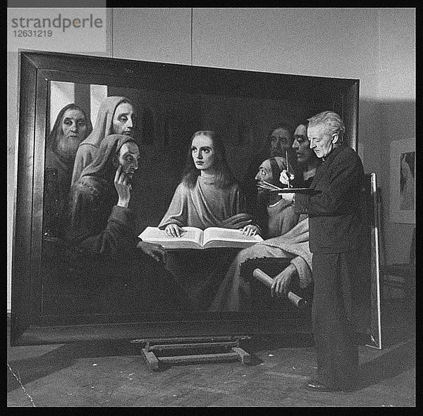 Han van Meegeren malt Jesus unter den Ärzten  1945. Künstler: Anonym