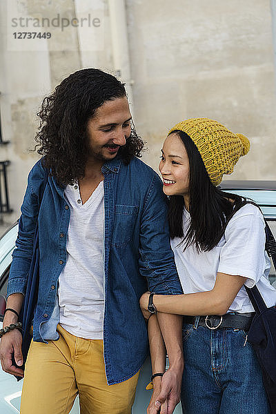 Happy young couple in love outdoors