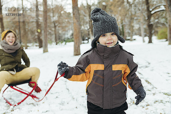 Portrait of little boy in the snow