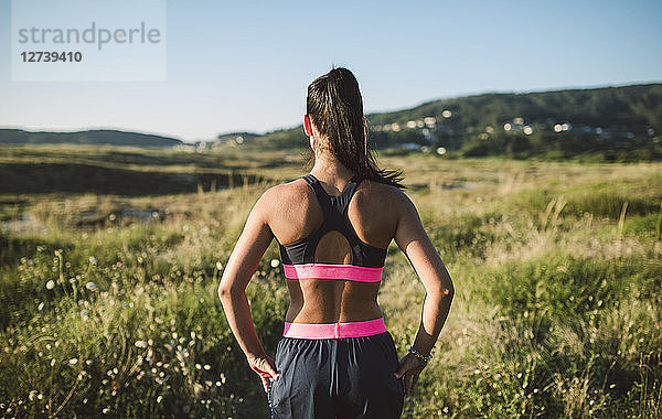 Portrait of a female jogger  rear view