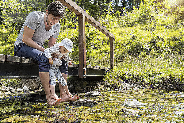 Father and daughter at Josefsthal mountain stream