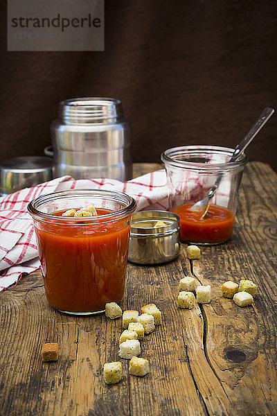 Tomato soup in thermos flask  croutons